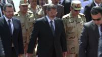 News video: Egypt's Morsi greets freed security personnel
