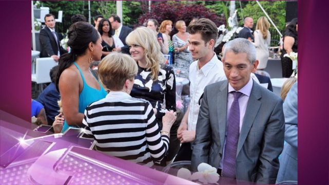 News video: Entertainment News Pop: Emma Stone Andrew Garfield Kiss For A Cure!