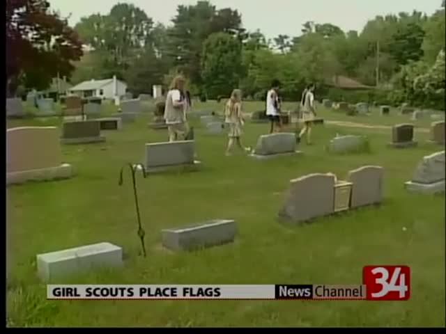 News video: Girl Scouts Place Memorial Day Flags 05-22-13